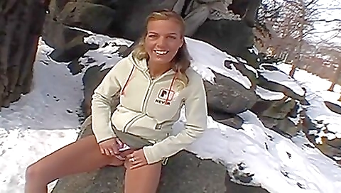 Outdoor girl in the backyard makes love with herself