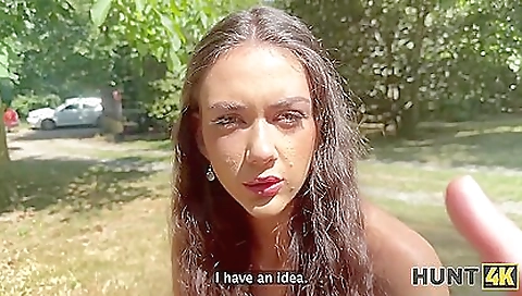 A brunette teen is fucking in the park by her boyfriend