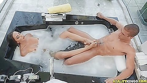 Milf is getting foot fucked by her lover in the bathroom