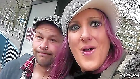 A gorgeous brunette with a big booty is playing with her pussy