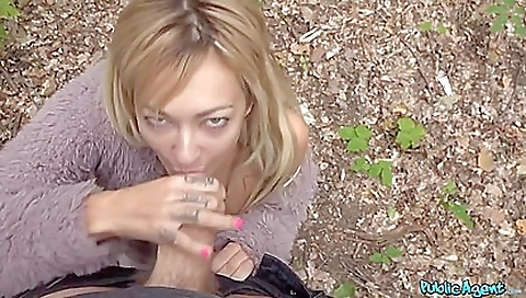 Slutty blonde fucks with her big black cock in the woods