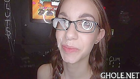 Busty brunette with a nice face gives her best friend a cheeky handjob