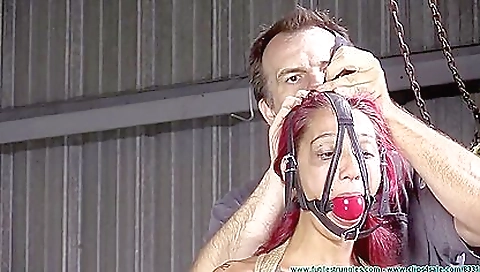 Hot brunette babe has a beautiful tattoo on her face and lips